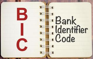 BIC - Bank Identifier Code acronym on notepad, business concept background photo