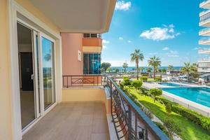 Fascinating view of the pool and the sea from the balcony, indispensable for summer months photo