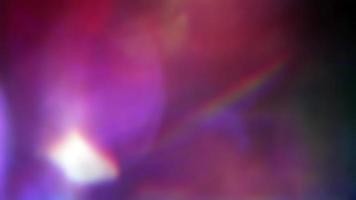 Loop abstract multicolored optical flare light leak background video