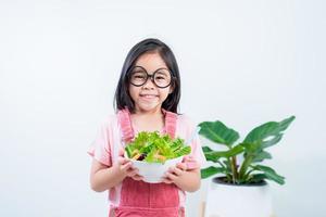 children girl asia eating vegetables photo