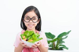 children girl asia eating vegetables photo