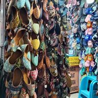 Collection of latest Juttis traditional shoes, Mahabaleshwar, India. photo