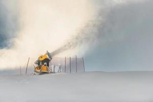 A snow cannon in action photo