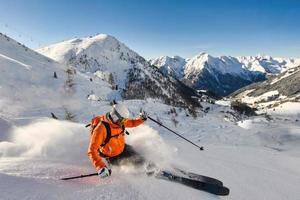 Free-rider skier in action photo