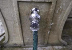 Faucet in the street photo