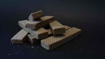 chocolate wafer on black background. photo