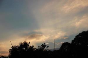 sunrise and sunset in the mountains with tree and clouds sky twilight dusk time photo