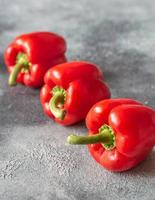 Fresh red peppers close up photo