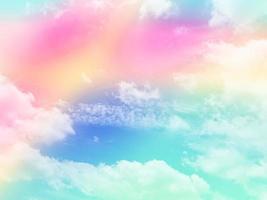 beauty sweet pastel pink yellow    colorful with fluffy clouds on sky. multi color rainbow image. abstract fantasy growing light photo