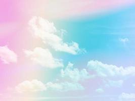 colorful with fluffy clouds on sky. multi color rainbow image. abstract fantasy growing light photo