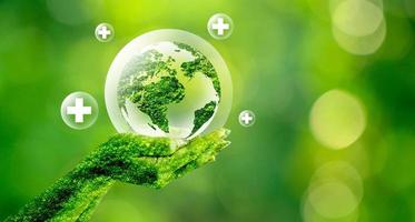 globo verde dentro de globos conceptuales que protegen el medio ambiente y la naturaleza foto