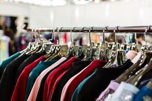 fashion clothing on hangers at the show photo