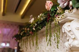 archway of many beautiful flowers, wedding arch with peonies Flowers for a wedding arch photo