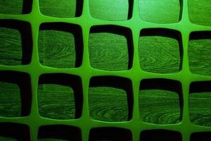 parrilla de madera en la pared celosía de decoración de madera verde foto