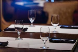 Glasses wine on table in sushi restaurant Serving in the restaurant on the table photo