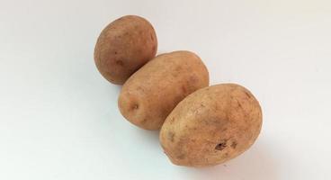 potato isolated on white background close up photo