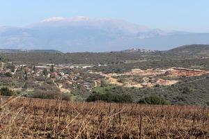 Snow lies on the top of Mount Hermon photo