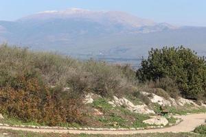 Snow lies on the top of Mount Hermon photo