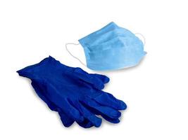 Medical respiratory mask and blue rubber gloves on white isolated background. Doctor's protection from viruses, covid-19 photo