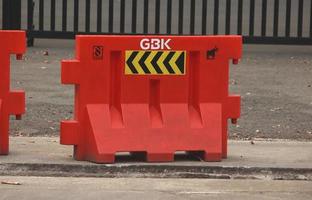 Jakarta, Indonesia - January 21th, 2023 - Orange red road block in Stadion Gelora Bung Karno area. photo