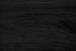 fondo de mesa negro de madera vista superior de textura oscura, tabla de suelo gris de lujo en blanco para el diseño foto
