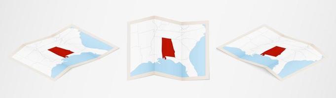 Folded map of Alabama in three different versions. vector