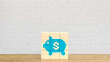 The blue piggy bank  on wood cube for business concept 3d rendering photo