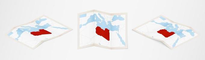 Folded map of Libya in three different versions. vector