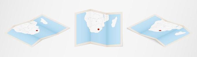 Folded map of Lesotho in three different versions. vector