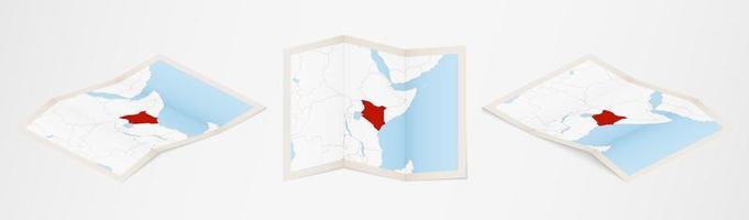 Folded map of Kenya in three different versions. vector
