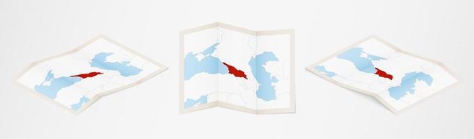 Folded map of Georgia in three different versions. vector