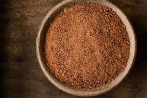 Ground Nutmeg in a Bowl photo