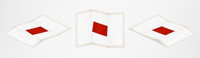 Folded map of Colorado in three different versions. vector