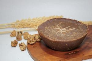 Gula Merah or Gula Jawa or Palm Sugar is a sweetener derived from any variety of palm tree photo