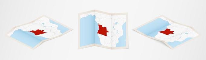 Folded map of Angola in three different versions. vector