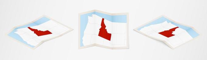 Folded map of Idaho in three different versions. vector