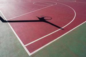 shadows on the street basket court photo