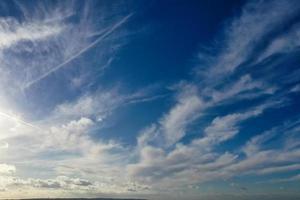 Dramatical Clouds and Blue Sky over the City photo