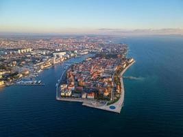 Aerial drone view of Zadar town in Croatia during beautiful sunset colors. The fortified old part of the city is a Unesco World Heritage Site. Venetian Works of Defence. photo