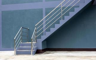 Close-up view of the background of the stairway sideways, the purple-gray wall. photo