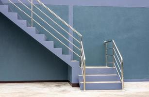 Close-up view of the background of the stairway sideways, the purple-gray wall. photo