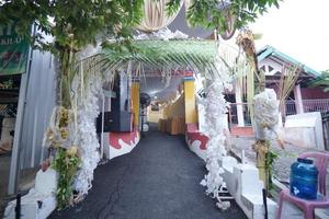 Wedding Aisle in a Traditional Wedding Ceremony in Indonesia photo