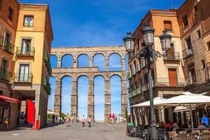 Historic street with roman aqueduct bridge, Segovia, Spain