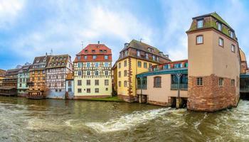Strasbourg old town Petite France quarter colorful houses along the river Ill, France photo