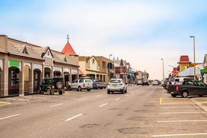 Downtown city center of Swakopmund with road trafic and german colonial buildings, Namibia photo
