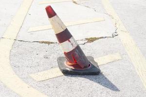 Cone background on the road hit by a car photo