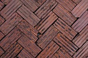 Walkway is paved with brown bricks photo