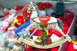 Christmas colorful toy horse for the fur in a supermarket photo