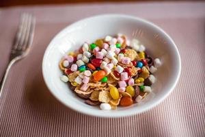 Fresh colorful granola breakfast in open cafe photo