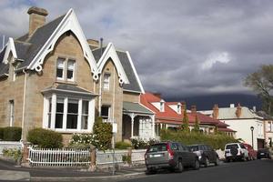 Hobart Town Residential Street Houses And Rainy Sky photo